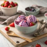 Ube strawberry ice cream with fresh strawberries